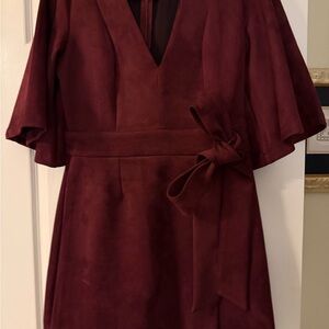Venus faux suede wrap dress in burgundy color.
